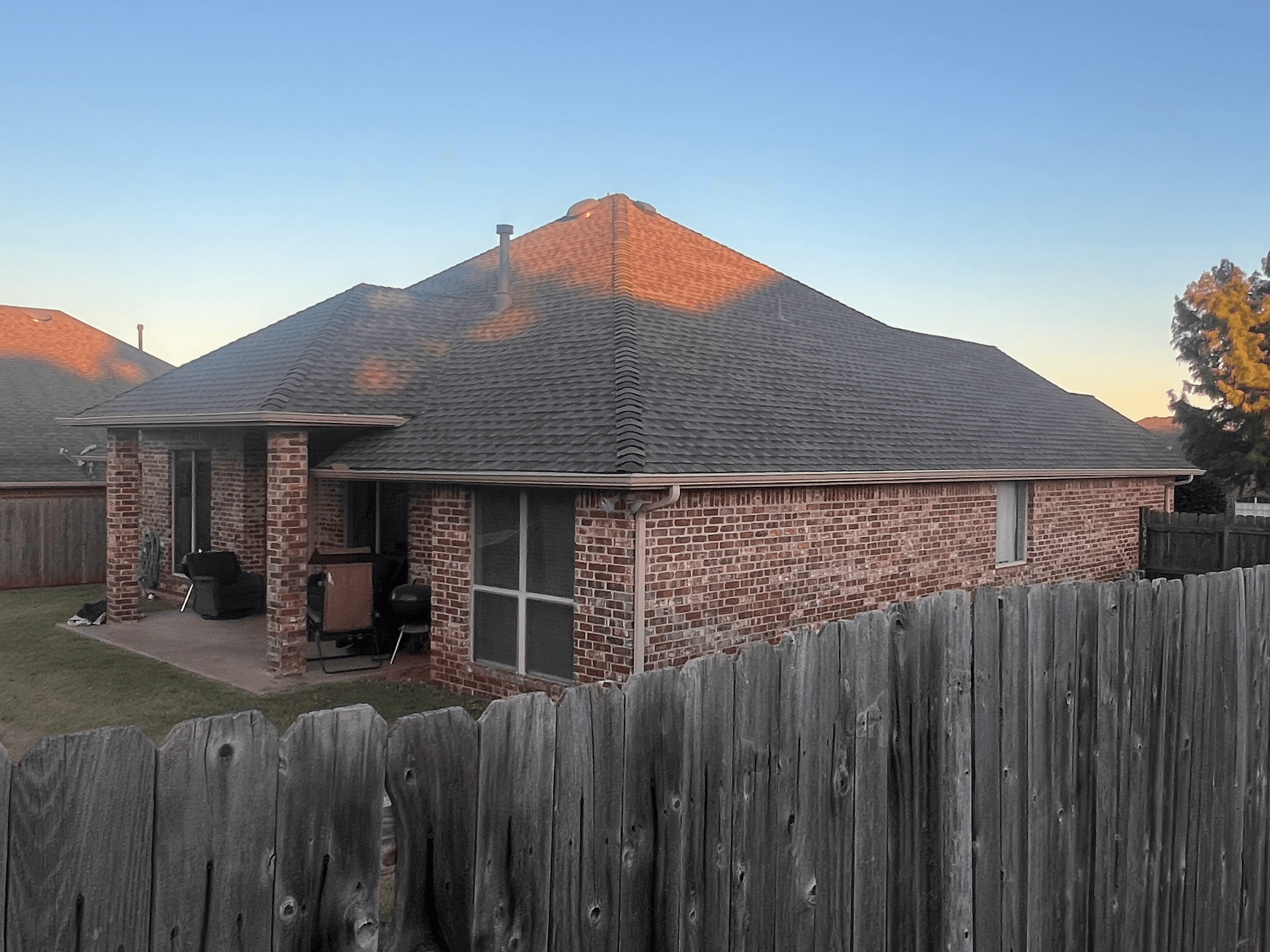 Completed residential roof replacement showcasing quality craftsmanship by Complete Dream Remodeling in OKC